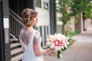 bridal gown and back tattoo