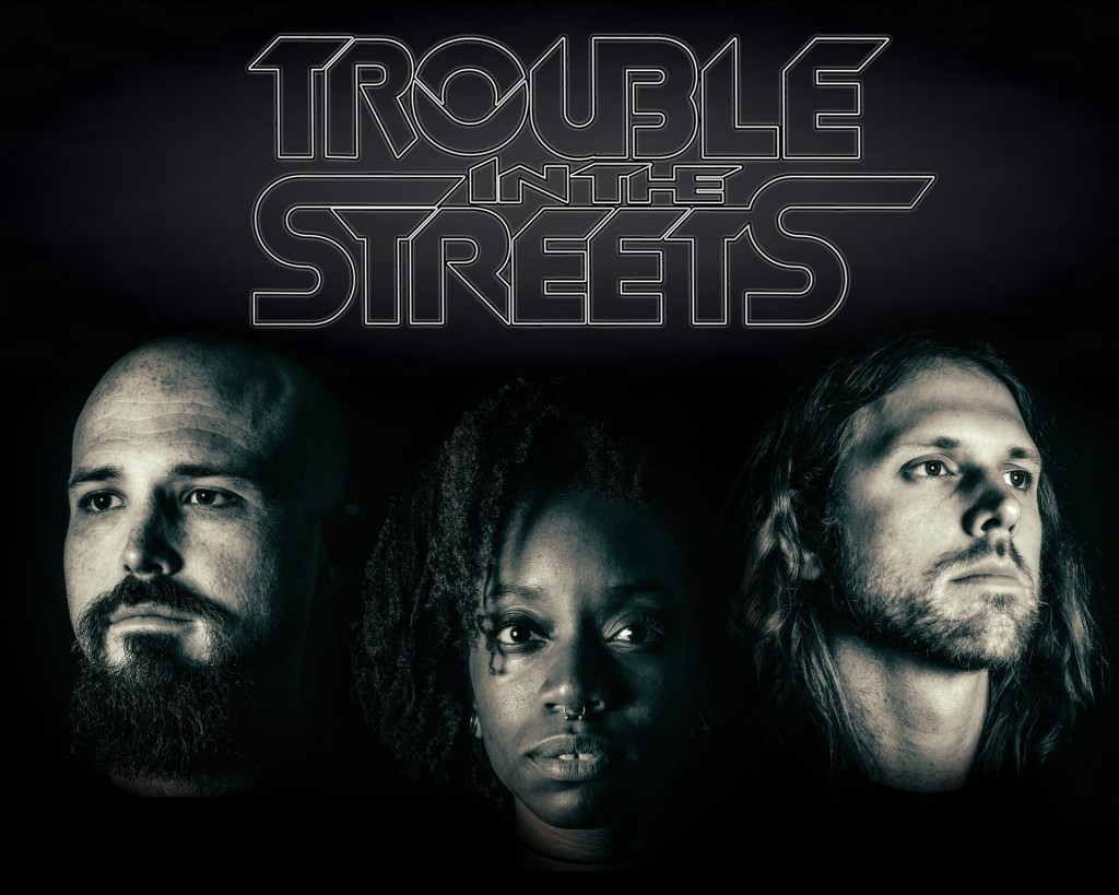 Trouble in the Streets promo shot. Press Junky. 