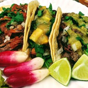 Three tacos on a plate